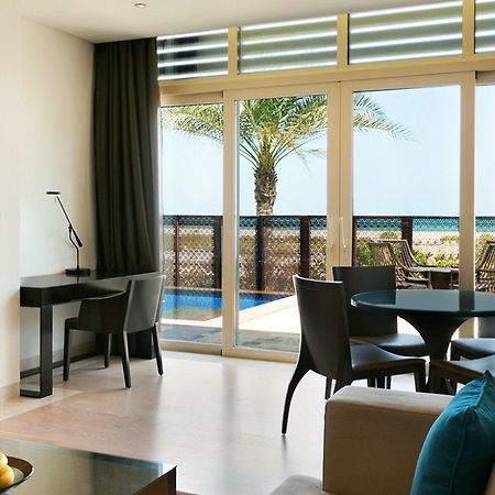 Park Hyatt Abu Dhabi Hotel&Villas Esterno foto A living room in a suite at Jumeirah Beach Hotel